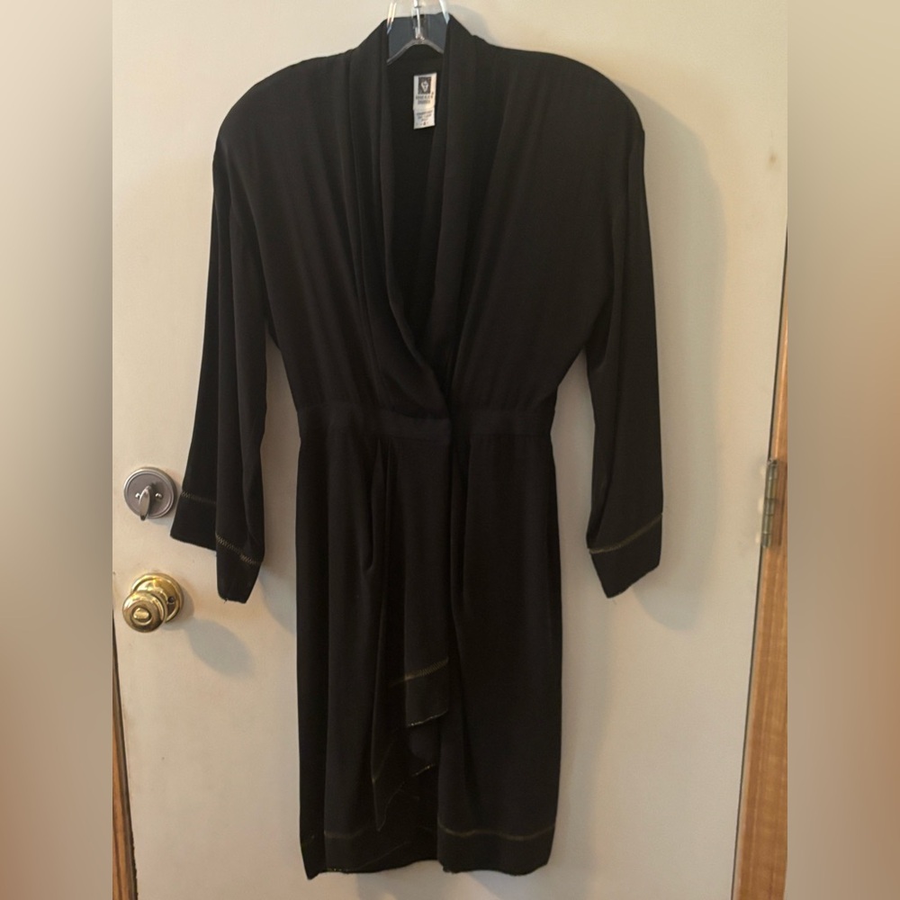 Black wrap cocktail dress with gold details. Size 4